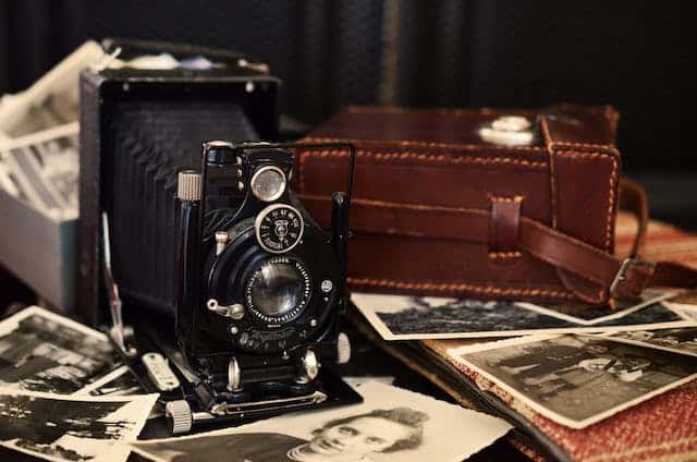 old vintage camera and photos