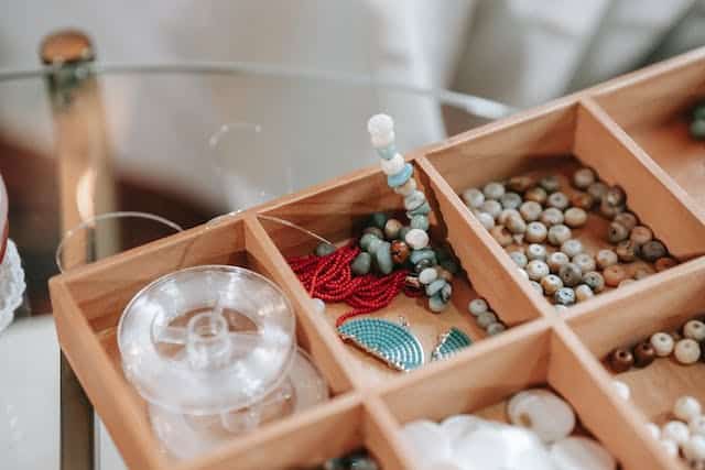 beads in wooden tray