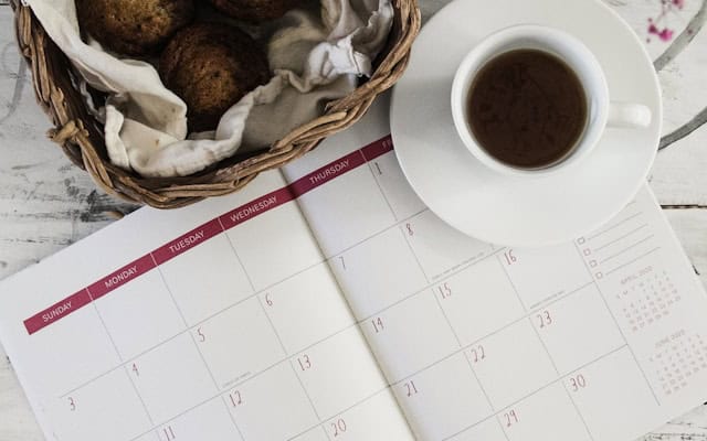 calendar and coffee cup